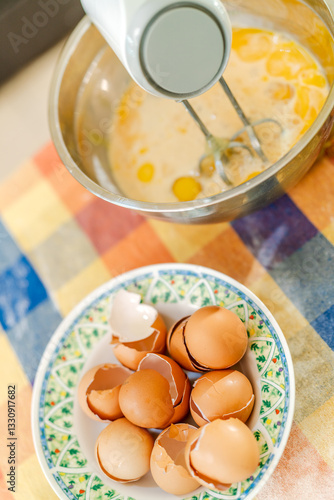 Wallpaper Mural Pastry chef whisking eggs in bowl with eggshells nearby Torontodigital.ca