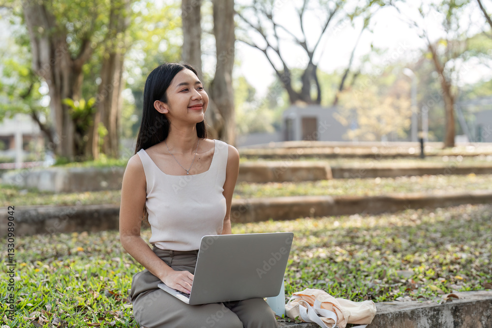 Sustainable work-life balance. Woman enjoying a moment of relaxation while working outdoors. Sustainable work-life balance. Woman enjoying a moment of relaxation while working outdoors.