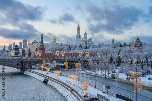 Grand Kremlin Palace, Beklemishevskaya Tower and the ensemble of the Kremlin Cathedral Square against the backdrop of the Bolshoy Moskvoretsky Bridge over the Moskva River, Moscow, Russia
