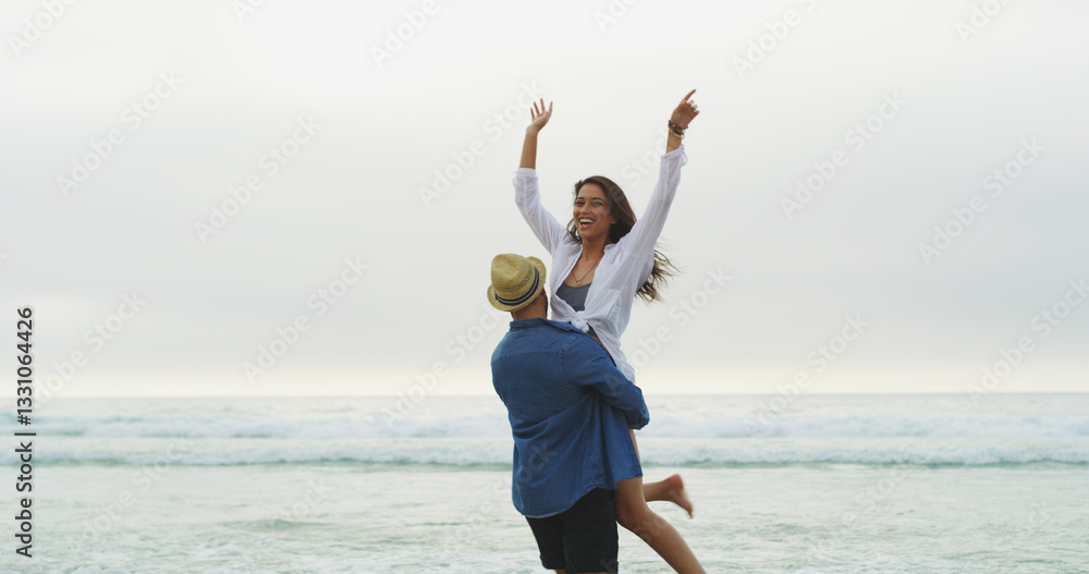 Couple, beach and lift for fun on vacation with honeymoon, holiday or bonding outdoor in nature. Excited woman, man and freedom by sea for memory, playful date and happy with space and energy Couple, beach and lift for fun on vacation with honeymoon, holiday or bonding outdoor in nature. Excited woman, man and freedom by sea for memory, playful date and happy with space and energy