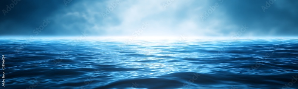 Serene ocean view with gentle waves under a soft blue misty light. Serene ocean view with gentle waves under a soft blue misty light.
