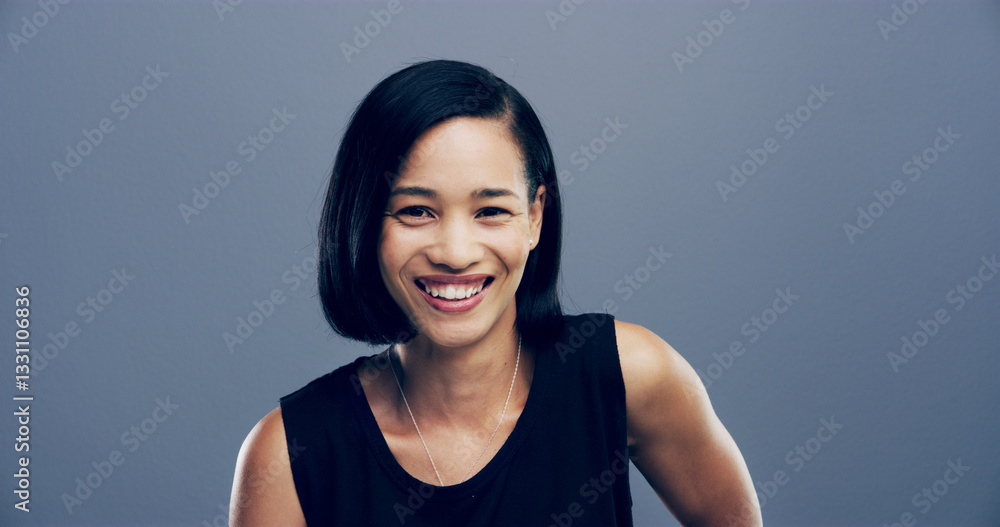 Portrait, happy and Asian woman in studio for ambition, creative career and about us as designer. Smile, female person and laughing for funny joke, confident and friendly attitude on gray background Portrait, happy and Asian woman in studio for ambition, creative career and about us as designer. Smile, female person and laughing for funny joke, confident and friendly attitude on gray background