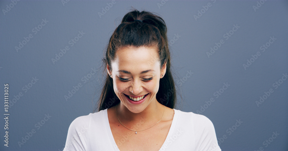 Happy, laughing and space with woman in studio for comedy, humor or playful joking. Comic, funny and silly with smile of excited model isolated on gray background mockup for reaction to good news Happy, laughing and space with woman in studio for comedy, humor or playful joking. Comic, funny and silly with smile of excited model isolated on gray background mockup for reaction to good news