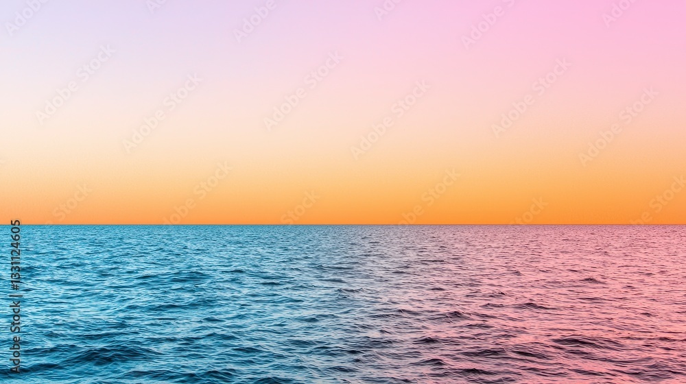 Obraz premium Serene Ocean Sunset Pink and Orange Gradient Sky Over Calm Blue Water