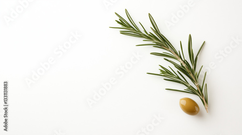 Rosemary and Olive: An overhead, eye-level view of a rosemary sprig and a single olive. 