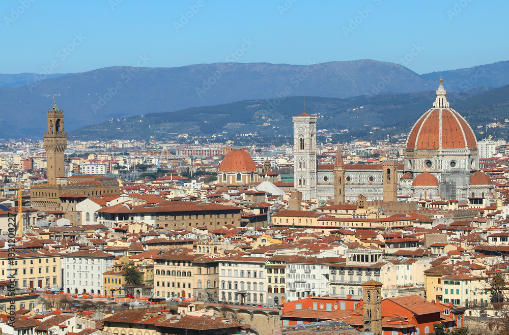 Obraz premium view from above of Florence in Italy with the most famous monuments from left to right: Palazzo Vecchio Tower, Giotto s Campanile, and the Duomo s Dome