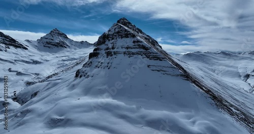 Aerial footage of beautiful high altitude mountains and lakes landscape