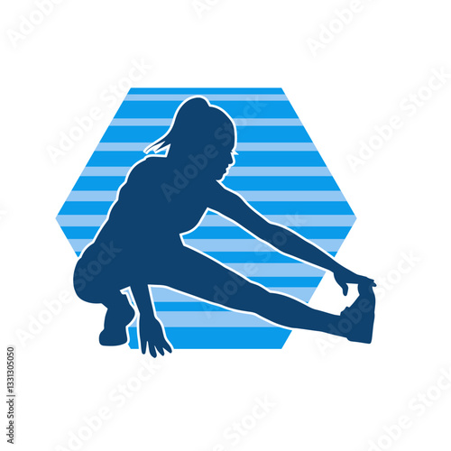 Silhouette of a slim sporty woman doing gym workout. Silhouette of a sporty female doing physical exercise. 