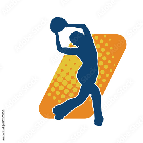 Silhouette of a slim sporty woman doing stretching exercise using gym ball. Silhouette of a sporty female doing physical workout using fitness ball. 