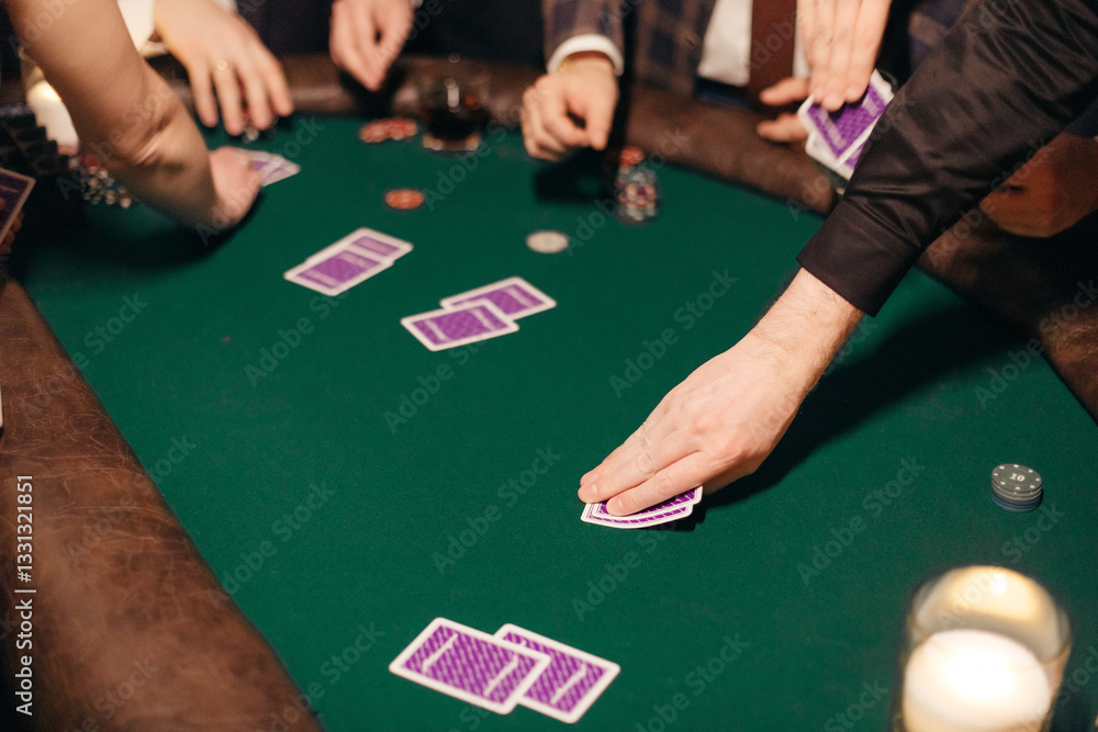 People playing poker on a evening party, entertainment