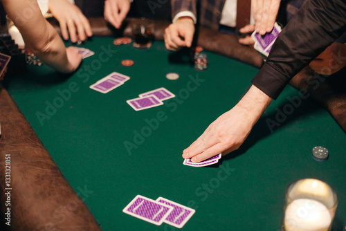 Obraz na płótnie People playing poker on a evening party, entertainment w salonie