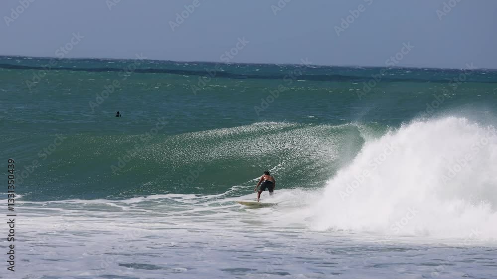 Surfer Riding Huge Waves at Kirra Beach Surfer Riding Huge Waves at Kirra Beach