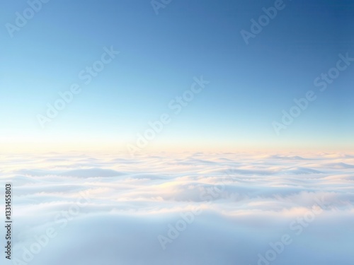 Aerial View of a Sea of Clouds at Sunrise