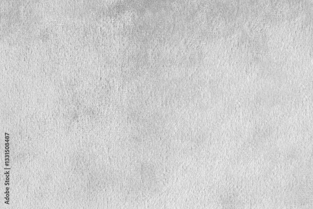 Fototapeta premium Faux fur, shiny silk velvet white fabric or cloth macro, close up. Fluffy fabric texture of artificial fur textile material. Canvas background. Decorative velours fabric backdrop, wallpaper