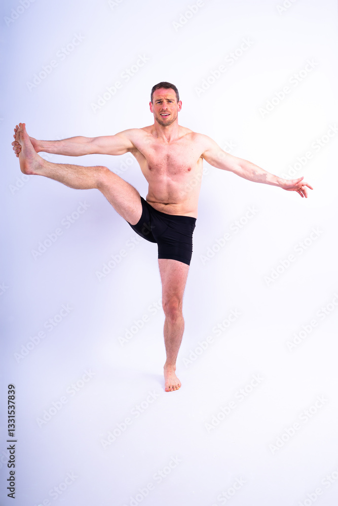 Obraz premium Portrait, happy man and bodybuilder with abs on studio background, backdrop and topless pride
