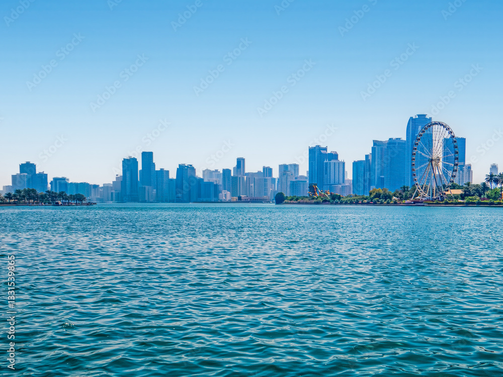 Naklejka premium View from the Al-Majaz embankment to the lake, Al-Montazah Park. UAE. Sharjah