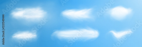 Realistic fluffy cloud set with soft transparency, glowing particles, and airy texture on a blue sky background for overlays and designs.