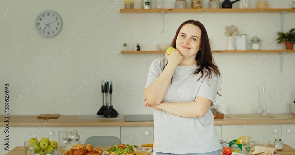 A Woman with a Bright Smile in a Modern Kitchen Surrounded by Fresh and Vibrant Ingredients A Woman with a Bright Smile in a Modern Kitchen Surrounded by Fresh and Vibrant Ingredients