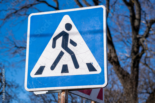 Pedestrian crossing sign alerting drivers to the presence of a crosswalk