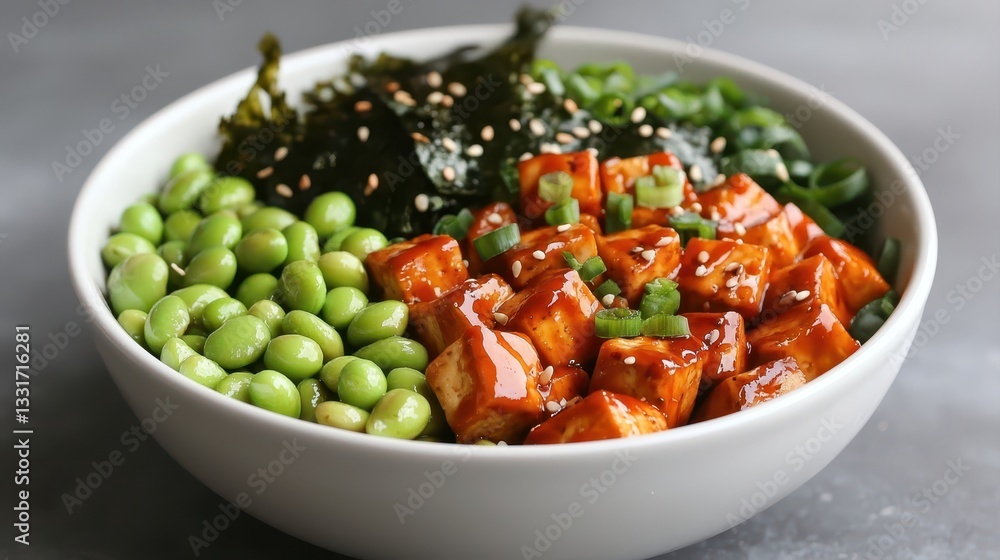 A vibrant bowl filled with edamame, marinated tofu, seaweed, and greens, garnished with sesame seeds, representing a healthy, colorful meal. A vibrant bowl filled with edamame, marinated tofu, seaweed, and greens, garnished with sesame seeds, representing a healthy, colorful meal.