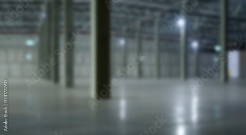 Blur an empty industrial warehouse with large, clean windows, atmospheric light, white.