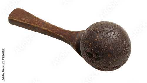 Unique wooden spoon with round head, designed for scooping and serving food in a rustic kitchen setting