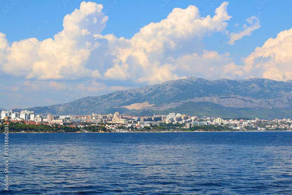 Contemporary buildings, gardens and beaches at the waterfront in Split, Croatia. View of Split from the boat.
