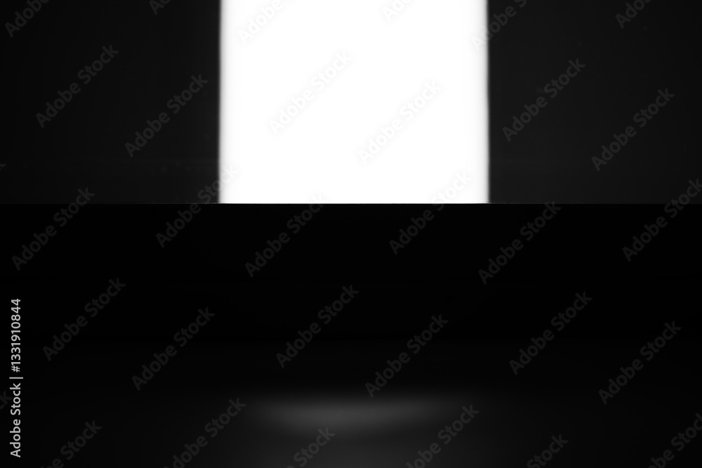Black and white background of square of light with copy space.