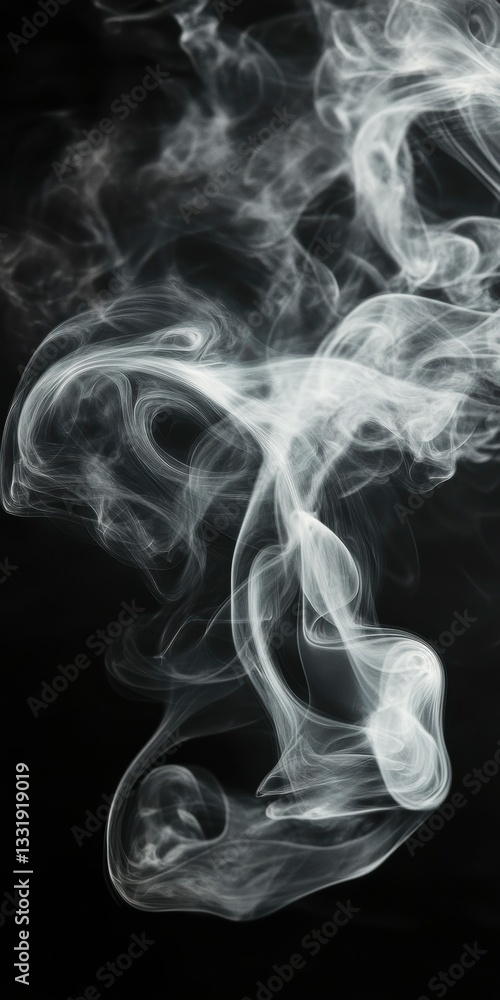 Fototapeta premium Smoke swirls create abstract shapes against a dark background