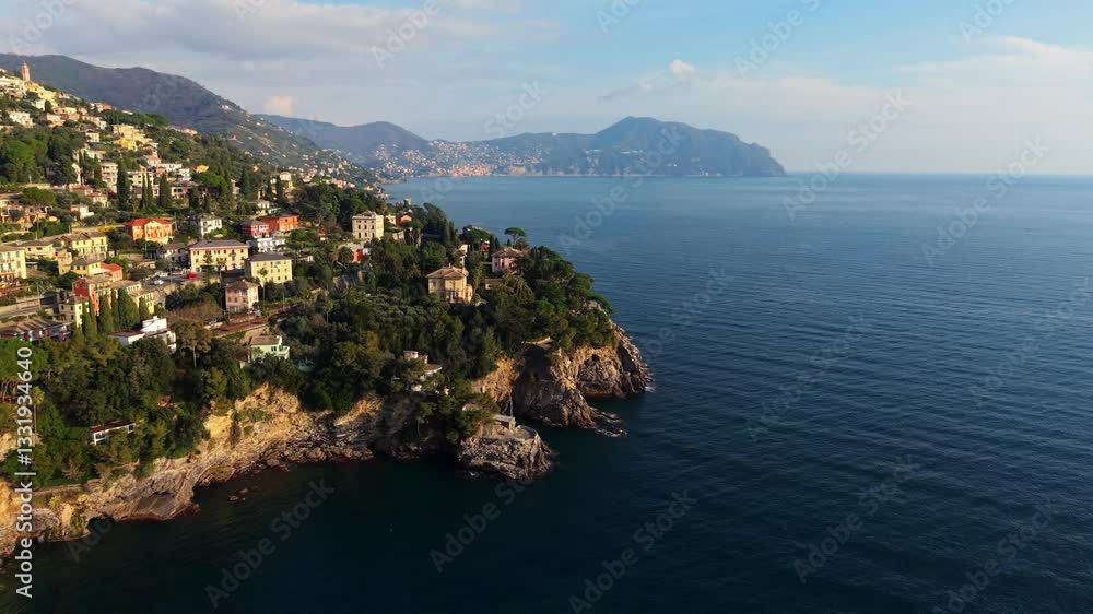 Peaceful coastal town in Italy with scenic views of the ocean, captured from above Peaceful coastal town in Italy with scenic views of the ocean, captured from above