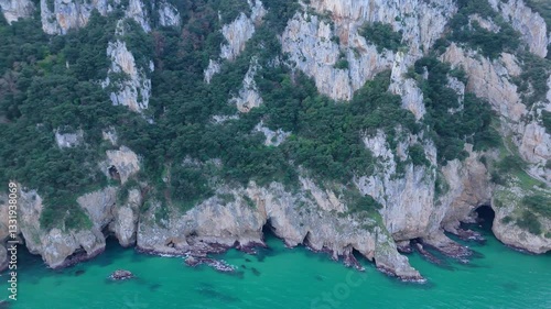 Rugged Coastline Meets Turquoise Waters. Mesmeric Frame Capture