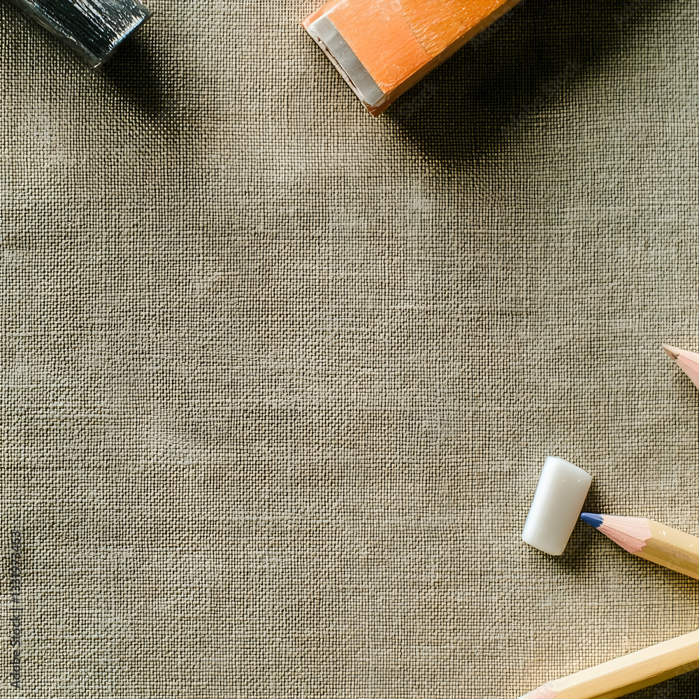 Obraz premium Top view pencils, erasers, canvas background; school supplies flatlay for education concept