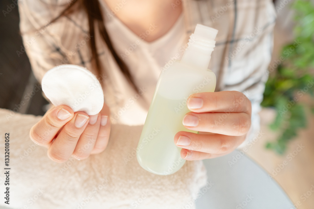 Naklejka premium Nail beauty and health using protective coatings with vitamins to strengthen and nourish the nail plate for a flawless manicure.