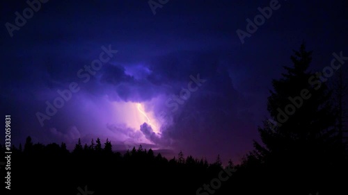 Lightning flashes in the sky. Thunder in the night sky