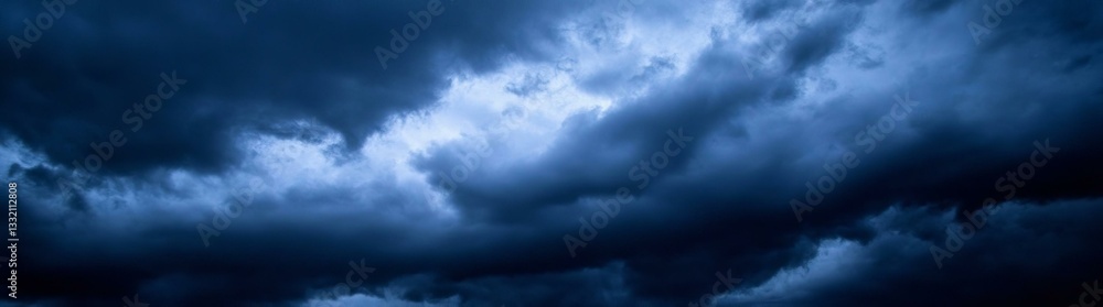 Fototapeta premium Heavy gray storm clouds. Gloomy sky background for design. Web banner.