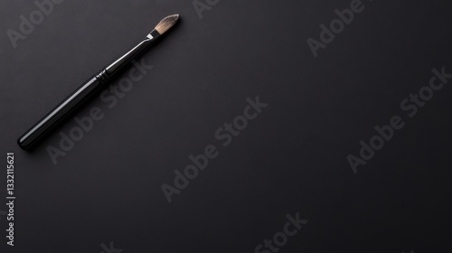 Wallpaper Mural Elegant cosmetic applicator contrasts against a dark, matter expanse Torontodigital.ca