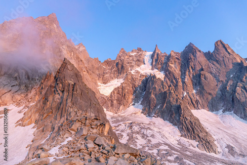 Aiguilles de Chamonix rocky granite mountain peaks in french Alps around Mont Blanc summit in Chamonix valley. Scenic landscape of iconic alpine summits the legends of mountaineering and alpinism