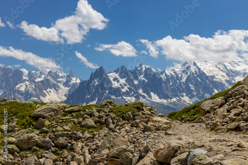 Aiguilles de Chamonix rocky granite mountain peaks in french Alps around Mont Blanc summit in Chamonix valley. Scenic landscape of iconic alpine summits the legends of mountaineering and alpinism