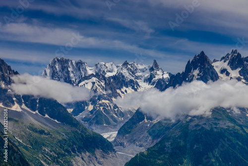 Aiguilles de Chamonix rocky granite mountain peaks in french Alps around Mont Blanc summit in Chamonix valley. Scenic landscape of iconic alpine summits the legends of mountaineering and alpinism