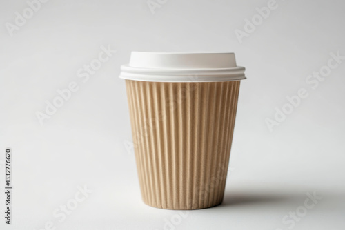 Wallpaper Mural Coffee cup with a white lid on a wooden table surrounded by books and a laptop. Morning light shining through the window. Torontodigital.ca
