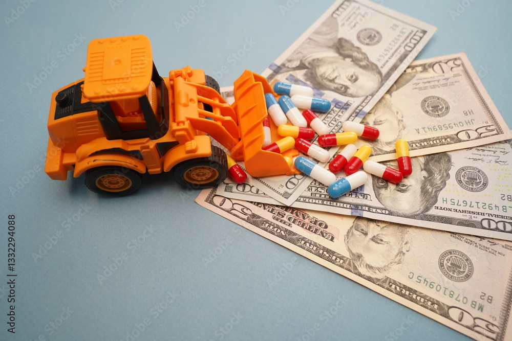 Fototapeta premium Euro banknotes and an excavator loading a handful of capsule tablets. Pharmaceutical business. Medicines. Spending on healthcare.