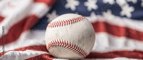 Obraz na płótnie white baseball is set against a waving American flag. w salonie