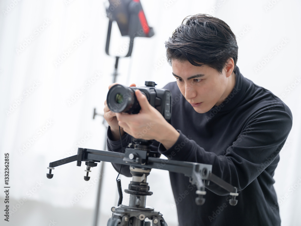Obraz premium カメラマン・男性・動画