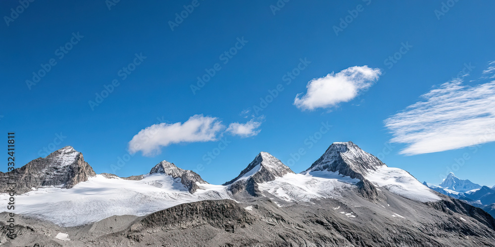 Fototapeta premium Glaciated Mountain Range Under Clear Sky