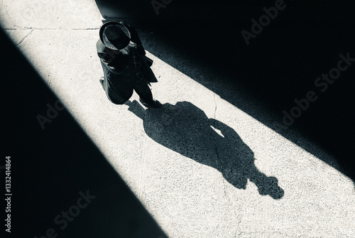 shadow of a man with hat