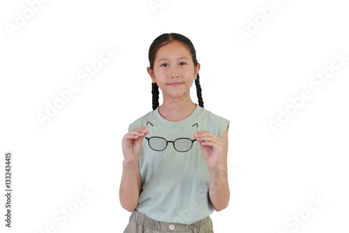 Obraz na płótnie Portrait of Asian girl preteen holding Eyeglasses to wear with looking camera isolated on white studio background. w salonie