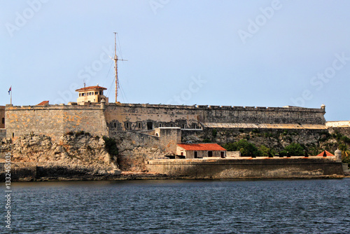 View of the Morro Castle. Also known as Castillo de los Tres Reyes del Morro, this fortress guards the entrance to Havana harbor. The castle was built in 1589. Havana, Cuba.
