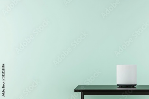 Wallpaper Mural tech review setup featuring modern gadget placed on sleek black table positioned against light green chroma key background Torontodigital.ca