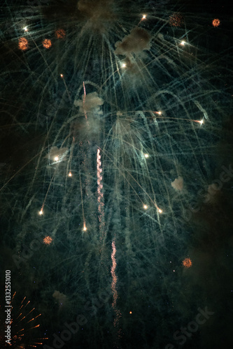 Dreamy background transition from fireworks dissipating and fireworks shooting up