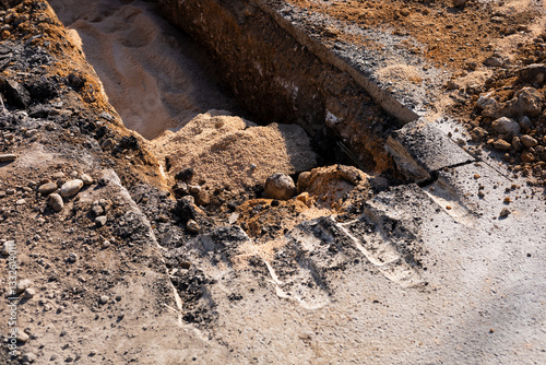 Wallpaper Mural Construction site showing a trench being dug for utility installation on a sunny day Torontodigital.ca